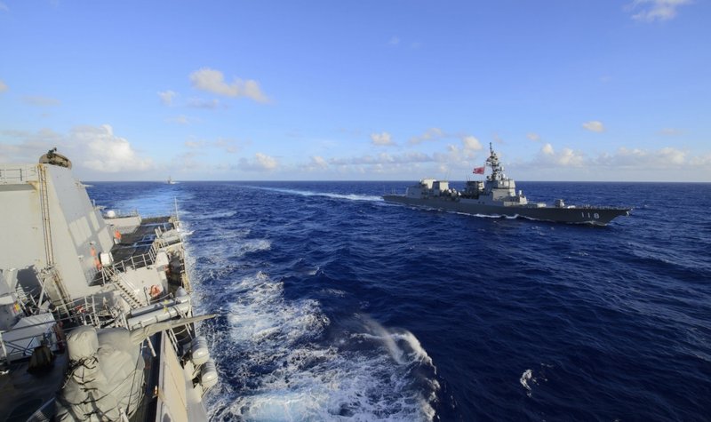 Japan to bolster patrols near disputed isles