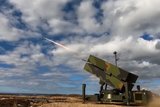 How do land and air defense forces defend against complex threats?
